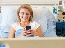 Cell Phones Newest Weapon in Fight Against Pain medical patient on cell phone