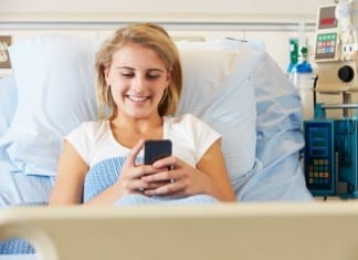 Cell Phones Newest Weapon in Fight Against Pain medical patient on cell phone