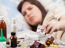 Woman with a Cold Thoroughly Fills Out ED Comment Card woman with common cold