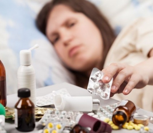 Woman with a Cold Thoroughly Fills Out ED Comment Card woman with common cold