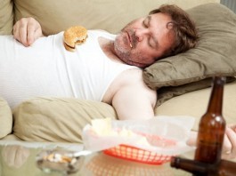 Hospital Merges with Fast Food, Tobacco Companies to ‘Stay Competitive’ man eating and smoking