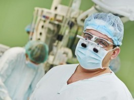 Surgeons to operate 6 feet away from patient in operating room surgeon operating