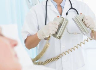 Hospitalist Administering CPR Interrupted With STAT Coding Query paddles for defibrillation