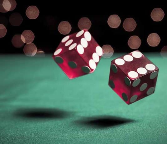 Triage Nurse Rolls Dice to Determine Patient Priority Level rolling dice