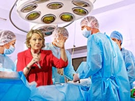 Dr. Clinton Gets Away with Wearing Pantsuit in OR
