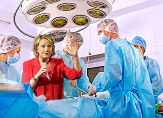 Dr. Clinton Gets Away with Wearing Pantsuit in OR