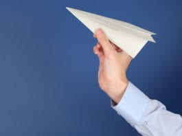 Stack of Paperwork Transforms into Fleet of Paper Planes paper airplane, paperwork