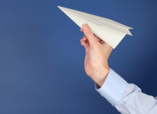 Stack of Paperwork Transforms into Fleet of Paper Planes paper airplane, paperwork