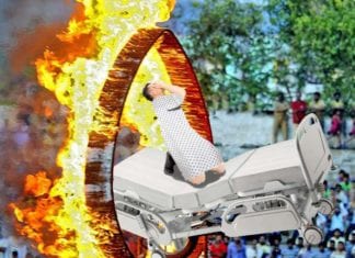 Daredevil Patient on Bed Jumps Through Ring of Fire