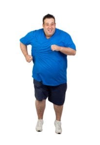 14113409 - fat man running isolated on white background