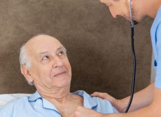 As Nurse Leans In for a Listen, Patient Can Think of No Better Time to Start Coughing Violently coughing