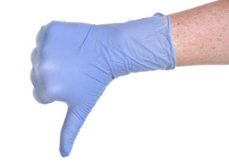 Fancy Pants Intern Throws Away Spare Disposable Glove Like Some Kind of Millionaire glove intern millionaire