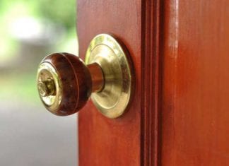 New Recommendations for Flu Vaccination: ‘Lick a Knob’ Campaign door knob