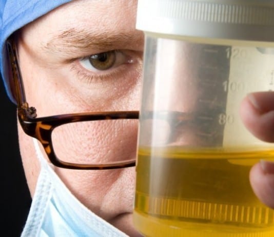 New Intern Hands Attending Cup of Urine on Rounds