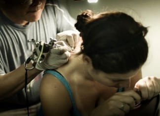 Sick of Scrub Machine Malfunctions Resident Gets Scrubs Tattooed on Body