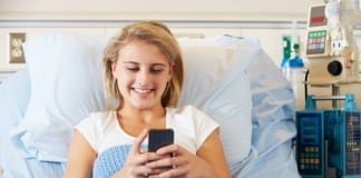 Cell Phones Newest Weapon in Fight Against Pain medical patient on cell phone