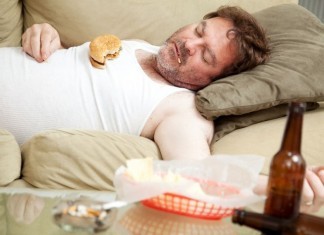 Hospital Merges with Fast Food, Tobacco Companies to ‘Stay Competitive’ man eating and smoking