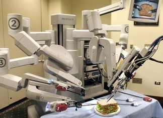 COVID-19 Breakthrough: Redeployed Da Vinci Can Swab One Patient Per Day davinci robot