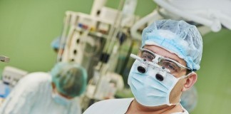 Surgeons to operate 6 feet away from patient in operating room surgeon operating