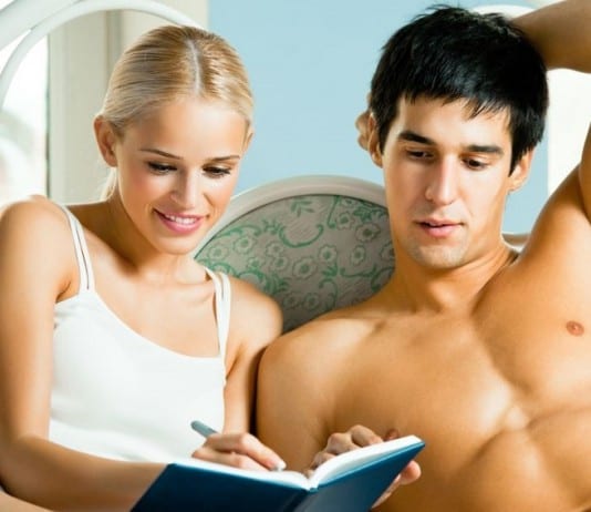 Hospital Administrator Gives Partner Post-Coital Satisfaction Survey Out Of Habit couple in bed filling out survey