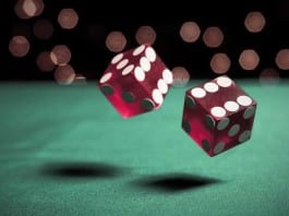 Triage Nurse Rolls Dice to Determine Patient Priority Level rolling dice