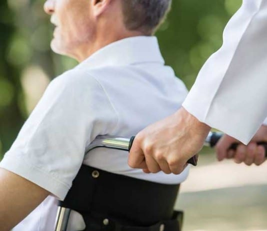 Surgeon Takes Clinic Patient Home to Avoid 30-Day Readmission wheelchair