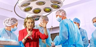 Dr. Clinton Gets Away with Wearing Pantsuit in OR