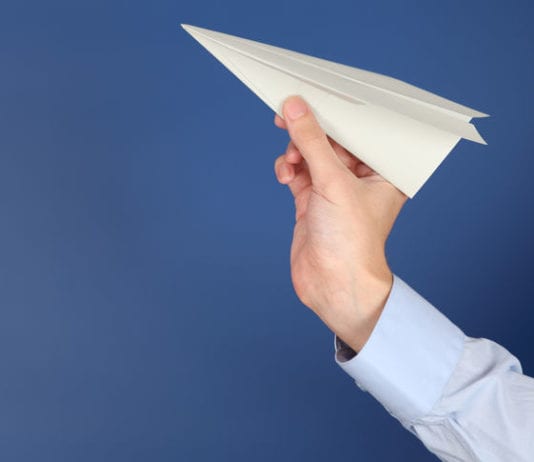 Stack of Paperwork Transforms into Fleet of Paper Planes paper airplane, paperwork