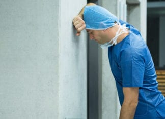 Nurse Waiting for Elevator Faces Stark Reality He Might Have to Take the Stairs elevator stairs