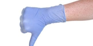 Fancy Pants Intern Throws Away Spare Disposable Glove Like Some Kind of Millionaire glove intern millionaire