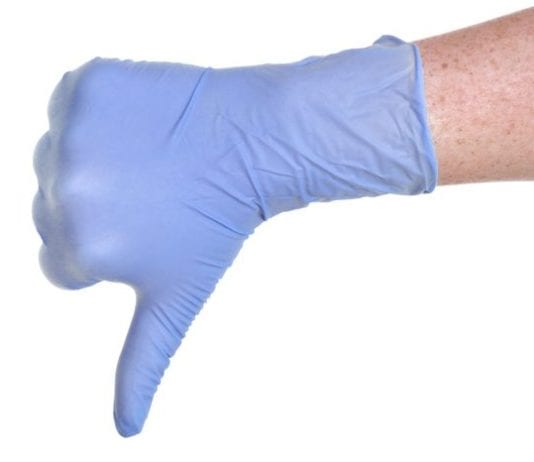 Fancy Pants Intern Throws Away Spare Disposable Glove Like Some Kind of Millionaire glove intern millionaire