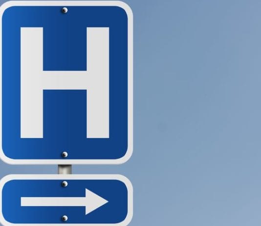 To Control Patient Volumes, Hospital Takes Down Hospital Signs Within 5-Mile Radius blue hospital sign hospital signs