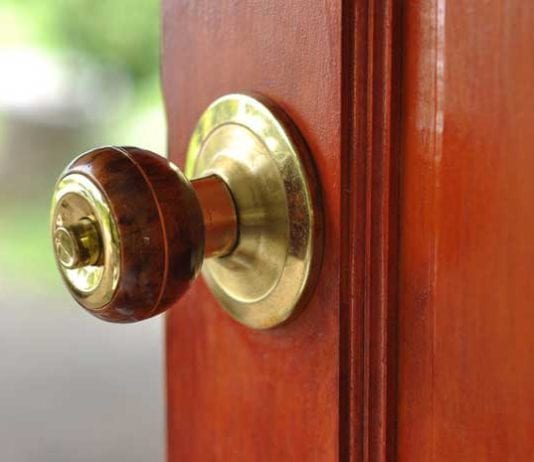 New Recommendations for Flu Vaccination: ‘Lick a Knob’ Campaign door knob